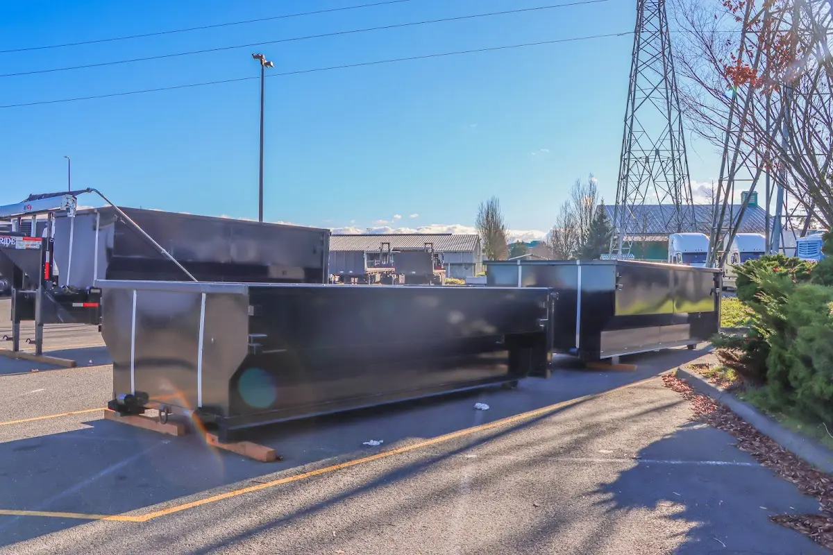 Roll-off dumpster ready for waste disposal at job site for 2 Yard Dumpster Rental in Bellwood